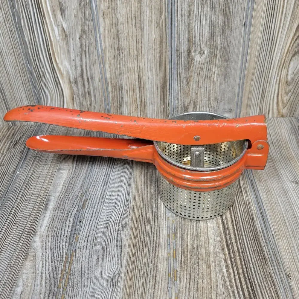 Vintage Handy Things Potato Ricer Red Metal Juicer Press Ludington Michigan MI